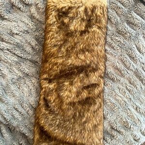 Christmas tree skirt.  Faux fur.  Size 48” x 48”.  New with tags.